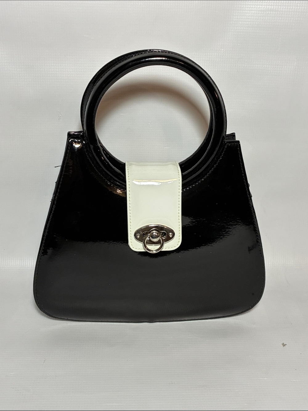 Black Patent Circle-Handle Shoulder Bag with White Accent